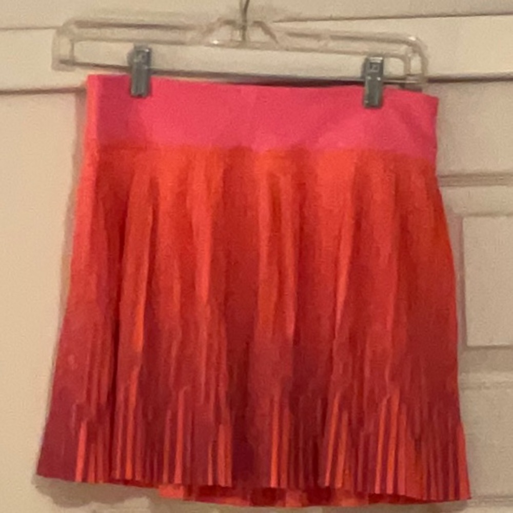 Hard to find ivivva skirt in pink,orange and purple